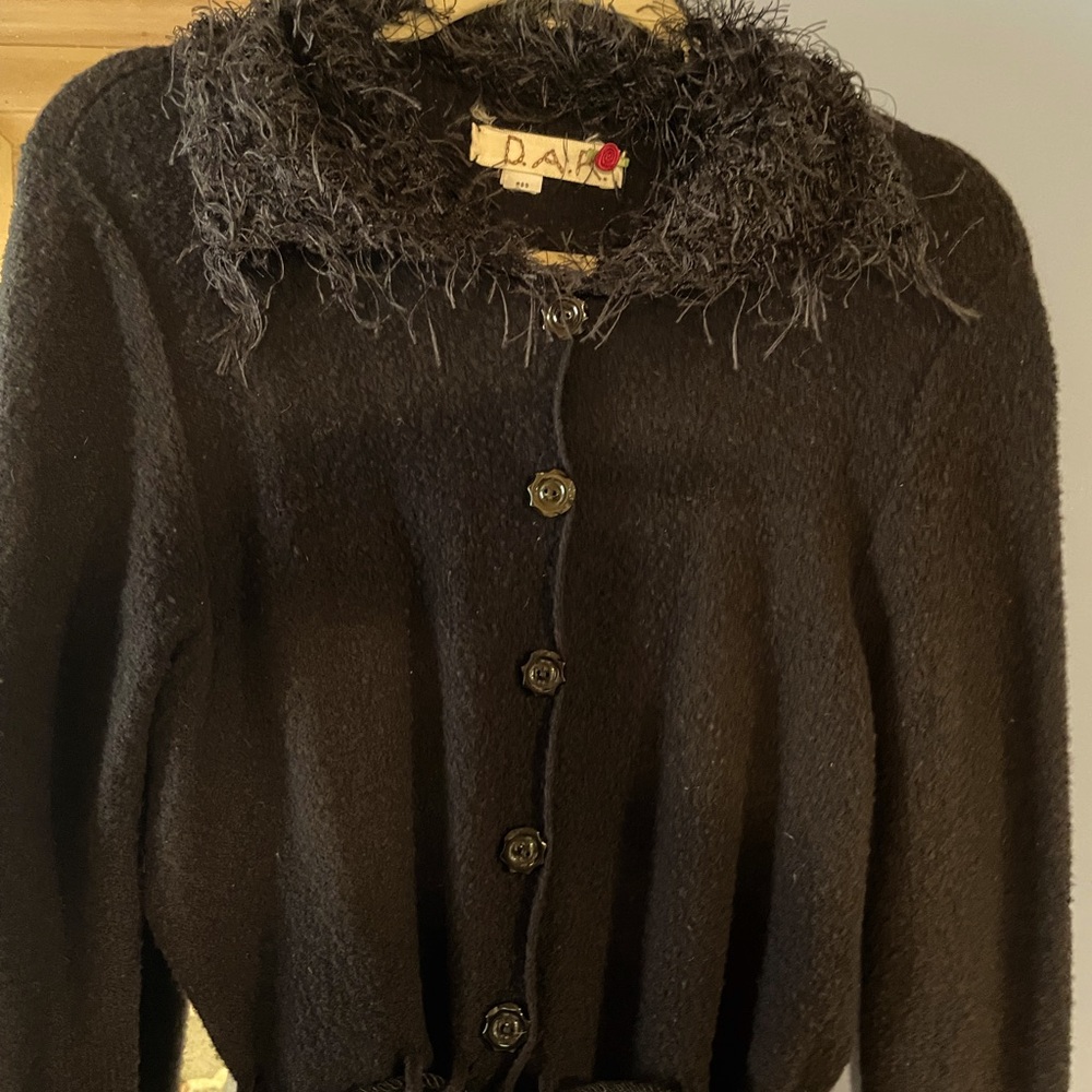 Black wool dressy sweater with tie waist.
